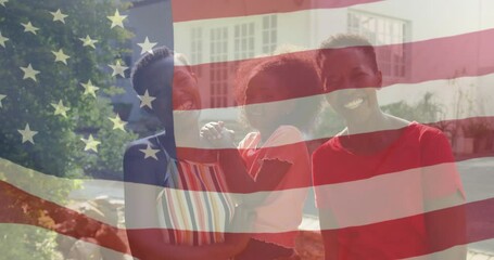 Animation of flag of usa over happy african american grandmother, mother and daughter - Powered by Adobe