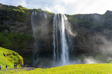 Seljalandsfoss, Iceland - 06.22.2023: Seljalandsfoss waterfall in Iceland in summer