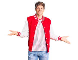 Young handsome man wearing baseball uniform smiling cheerful with open arms as friendly welcome, positive and confident greetings