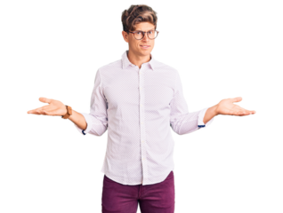 Young handsome man wearing business clothes and glasses clueless and confused with open arms, no idea concept.