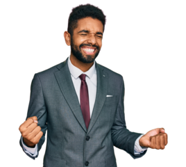 Young african american man wearing business clothes excited for success with arms raised and eyes closed celebrating victory smiling. winner concept.