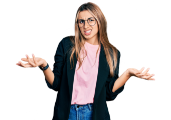 Hispanic young woman wearing business jacket and glasses clueless and confused with open arms, no idea concept.