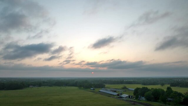 Dramatic Sunset Over Rural Fields With Farm Houses In Gentry, Arkansas. hyperlapse