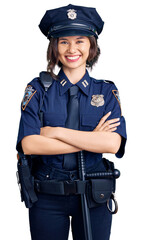 Young beautiful girl wearing police uniform happy face smiling with crossed arms looking at the camera. positive person.