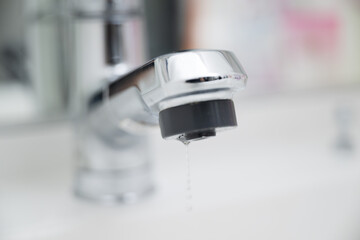 Water coming out of a tap