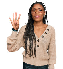 African american woman wearing casual clothes showing and pointing up with fingers number four...