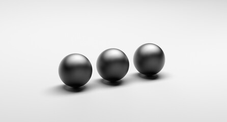 Black balls, matte metallic spheres on a white background. 3 balls abstraction, concept, wallpaper.Minimalistic abstraction with spheres, round balls. 3D render