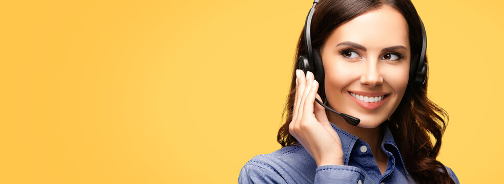 Contact Call Center Service. Customer support, female sales agent. Caller or answering phone operator or businesswoman in headset. Brunette young woman. Orange yellow color background, copy space area