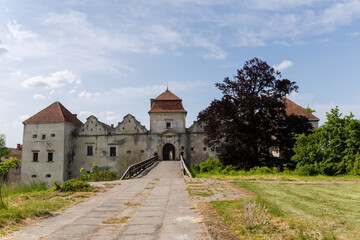 Fototapeta na wymiar Ancient castle from the main entrance in Svirzh village, Ukraine