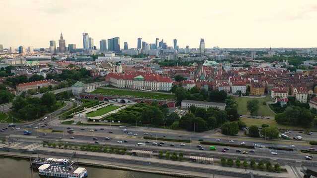 Aerial panorama of Warsaw, Poland over the Vistual river and City center in a distance Old town. Downtown skyscrapers cityscape. Business