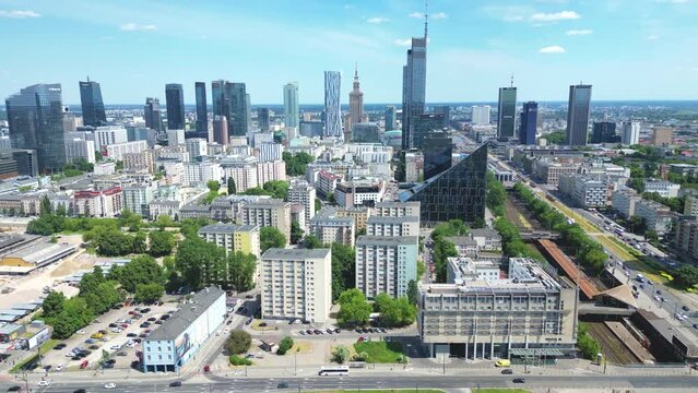 Aerial panorama of Warsaw, Poland over the Vistual river and City center in a distance. Downtown skyscrapers cityscape. Business