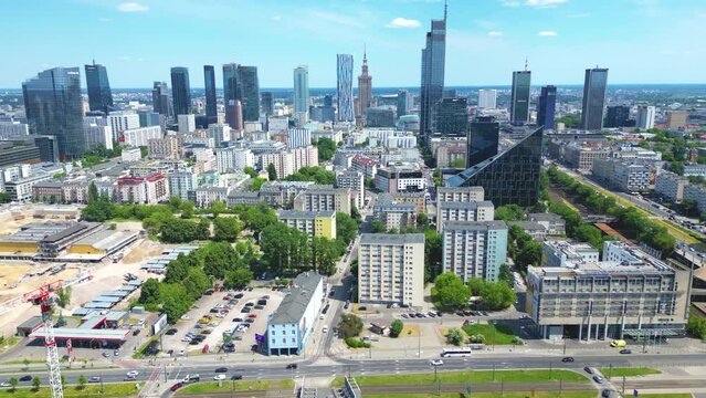 Aerial panorama of Warsaw, Poland over the Vistual river and City center in a distance. Downtown skyscrapers cityscape. Business