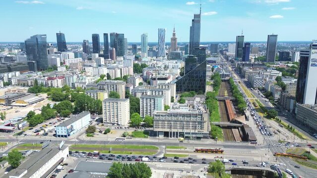 Aerial panorama of Warsaw, Poland over the Vistual river and City center in a distance. Downtown skyscrapers cityscape. Business