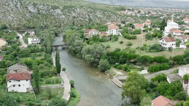 Aerial video on the village of Blaj and the river Bona. Mostar, Bosnia
