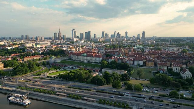 Aerial panorama of Warsaw, Poland over the Vistual river and City center in a distance Old town. Downtown skyscrapers cityscape. Business