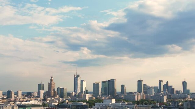 Aerial panorama of Warsaw, Poland over the Vistual river and City center in a distance Old town. Downtown skyscrapers cityscape. Business