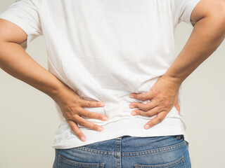 Waist pain prevention and management for better well-being. Posture, stretching, and exercise for...