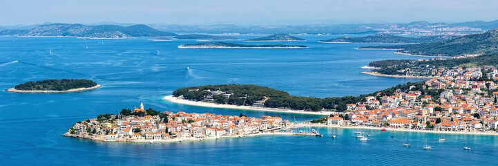 Primosten town on a peninsula vacation in the Mediterranean Sea panorama in Primošten, Croatia