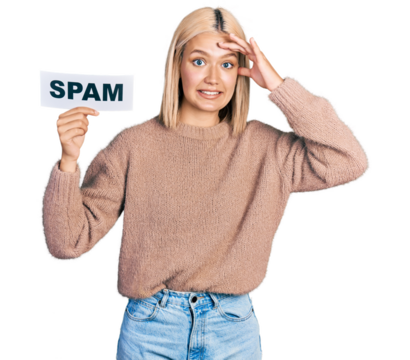 Beautiful young blonde woman holding spam banner stressed and frustrated with hand on head, surprised and angry face