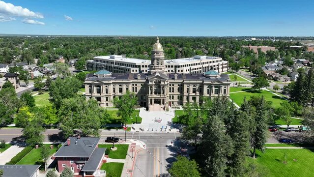 State capitol building of Wyoming. Cheyenne, WY is the capital city. Aerial dolly forward towards government building.