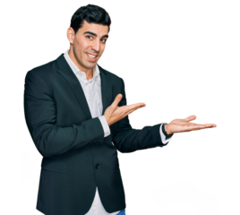 Handsome hispanic man wearing business clothes inviting to enter smiling natural with open hand