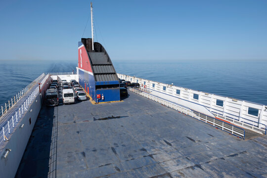 TRAVEM&Uuml;NDE, GERMANY - JUNE 08 2023: Rather empty car deck on the StenaLine ferryboat Stena Flavia from Travem&uuml;nde (Germany) to Liepāja (Latvia)