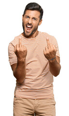 Handsome hispanic man wearing casual clothes showing middle finger doing fuck you bad expression,...