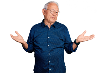 Senior man with grey hair wearing casual shirt and glasses clueless and confused expression with arms and hands raised. doubt concept.