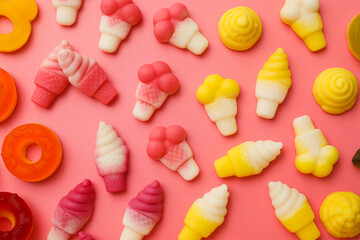Jelly candies on pink background, top view