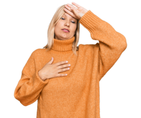 Middle age caucasian woman wearing casual winter sweater touching forehead for illness and fever, flu and cold, virus sick