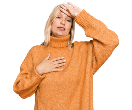 Middle age caucasian woman wearing casual winter sweater touching forehead for illness and fever, flu and cold, virus sick