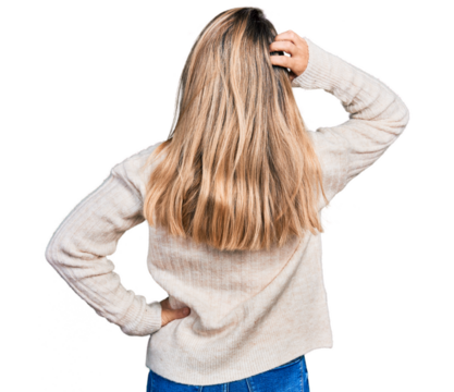 Young blonde woman wearing casual clothes backwards thinking about doubt with hand on head