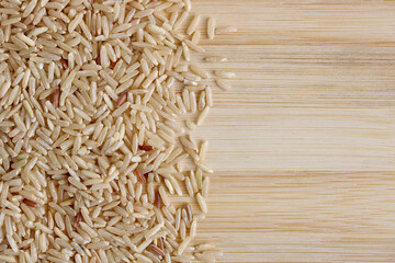 Brown Rice Grains On Wood Board 1