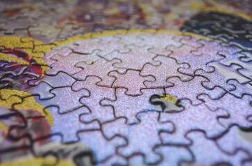 Selective focus of pieces puzzle, puzzle background.