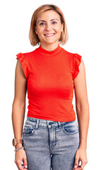 Obraz premium Young blonde woman wearing casual clothes with a happy and cool smile on face. lucky person.