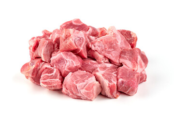 Raw pork pieces, isolated on white background.