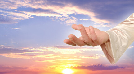 Plakat biblical scene, close-up of Jesus Christ Hand against sunset in evening beautiful dramatic sky ask for follow or following offer, offering, Holy Scriptures Old and New Testaments, Christian religion