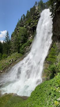 Stuibenfall waterfall bigest waterfall in Tirol in the Ötztal  valley in Tyrol Austria during a beautiful springtime day in the Alps. Slow motion clip.