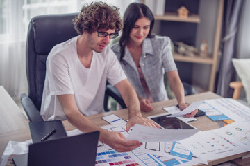 Mobile app developers collaborates to brainstorm, select ideas, optimizing procedure. Picking the best options, ensuring scalable, user-friendly interfaces. Prototyping functionality, color choices.