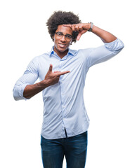 Afro american business man wearing glasses over isolated background smiling making frame with hands and fingers with happy face. Creativity and photography concept.