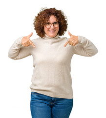 Beautiful middle ager senior woman wearing turtleneck sweater and glasses over isolated background looking confident with smile on face, pointing oneself with fingers proud and happy.