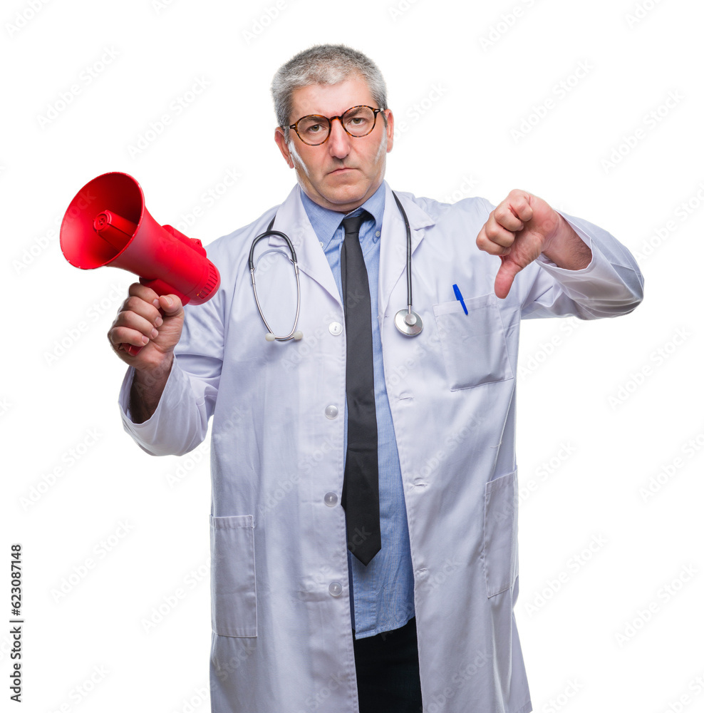 Sticker Handsome senior doctor man yelling through megaphone over isolated background with angry face, negative sign showing dislike with thumbs down, rejection concept