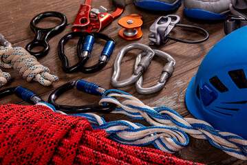 Climbing equipment for mountaineering and hiking helmet, hammer, carabiner, trekking shoes and...