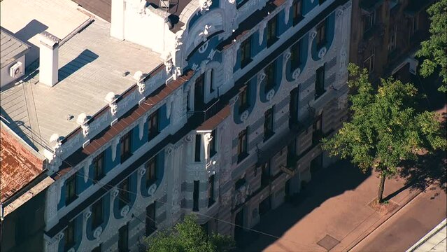 aerial wide shot of blue, beautiful, renovated  Art Nouveau building in Riga
