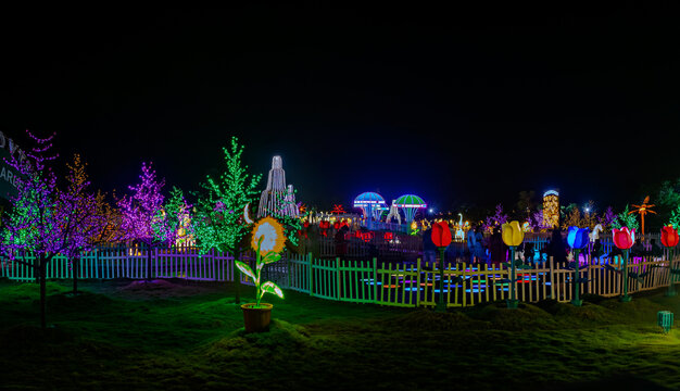 Kevadia, Gujrat, India-March 28th, 2023: Intentional slow shutter speed, night image of Illuminated with thousands of LED bulbs , Unity Glow Garden is a place of tourist attraction in Kevadia, India.