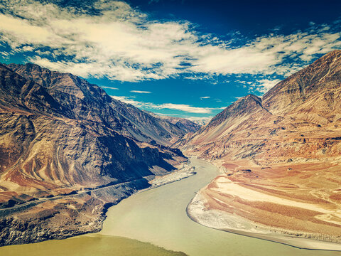 Vintage retro effect filtered hipster style image of confluence of Indus and Zanskar rivers in Himalayas. Indus valley, Ladakh, India