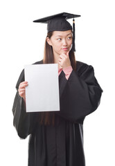 Young Chinese woman wearing graduate uniform holding paper degree serious face thinking about question, very confused idea