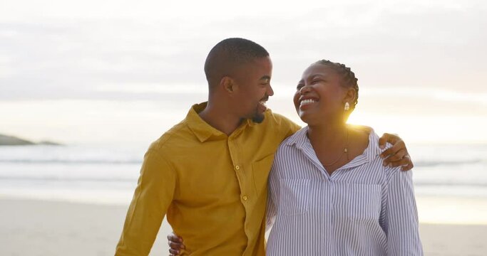 African couple, beach and hug for walk with love in outdoor for quality time on vacation with sunset. Happiness, man and women with bonding or ocean for travel or holiday are together in summer.