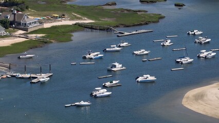 Boats docked in harbor on beautiful sunny day at Cape Cod 