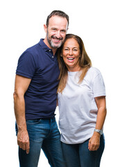 Middle age hispanic casual couple over isolated background with a happy and cool smile on face....